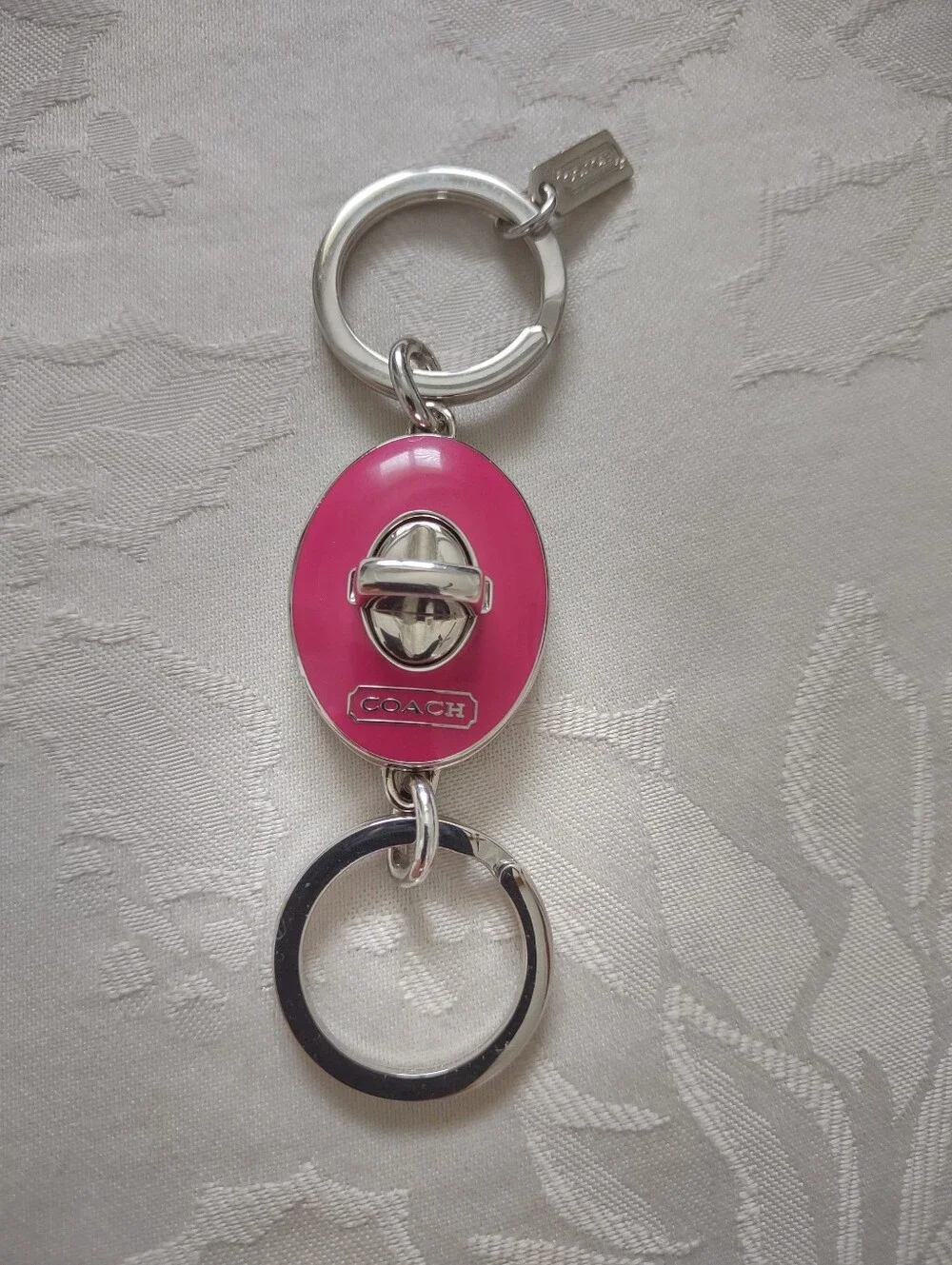 Coach Turn Lock Charm Two Key Chains